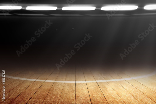 Close up view of a basketball court with wooden floor and spotlights