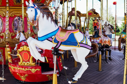 Kid attractions colorful carousel horse fun x © dmitriisimakov