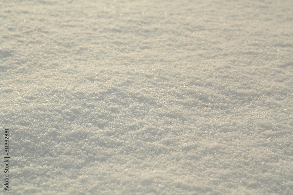 Shiny white snow background with blur effect. Shiny white snow background with blur effect.