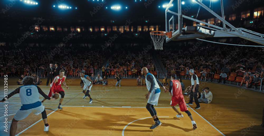 Fototapeta premium Basketball players on big professional arena during the game. Tense moment of the game. Celebration