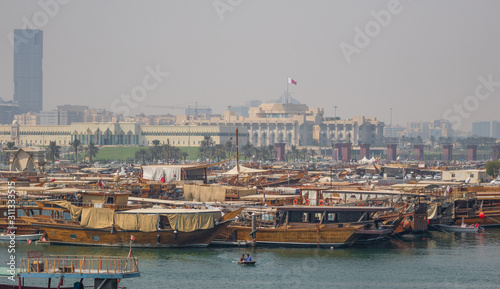 Doha, Qatar - located at the Eastern side of the Corniche, the Dhow Harbour is one of the main landmarks of Doha, and show a full display of traditional boats and vessels © SirioCarnevalino