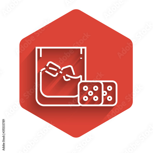 White line Game dice and glass of whiskey with ice cubes icon isolated with long shadow. Casino gambling. Red hexagon button. Vector Illustration
