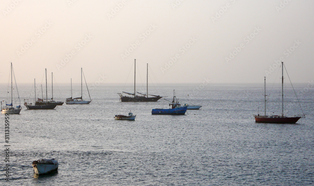 many sailboats anchored in the harbor of Tarrafal in the Cape Verde Islands