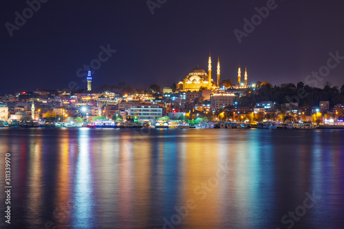 Night view of illuminated Eminonu district with Suleymaniye Camii, Istanbul, Turkey