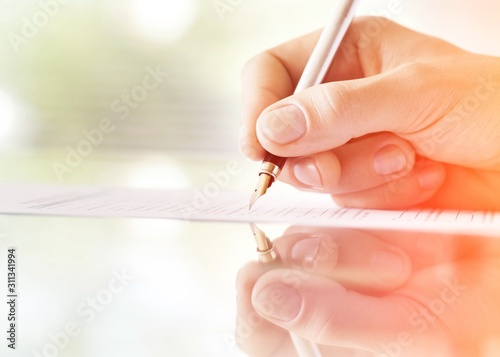 Businessman is signing a contract  business contract details