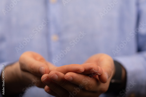 Businessman without head holding something without theme