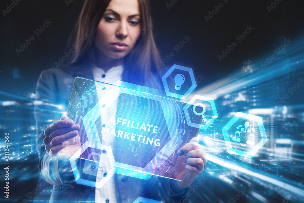 Business, Technology, Internet and network concept. Young businessman working on a virtual screen of the future and sees the inscription: Affiliate marketing Business, Technology, Internet and network concept. Young businessman working on a virtual screen of the future and sees the inscription: Affiliate marketing