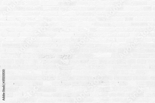 Old white brick wall texture background.