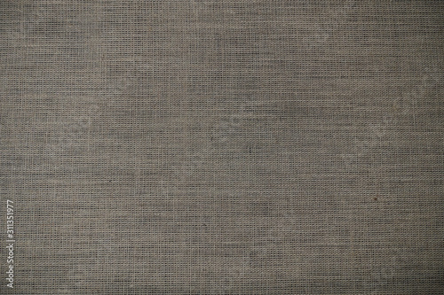 Burlap on a black background. Gray Screen Pattern Background.