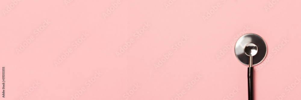 Medical stethoscope on a pink background. Concept of health care, medicine, virus, epidemic, high quality, the best in the world. Banner. Flat lay, top view - obrazy, fototapety, plakaty 