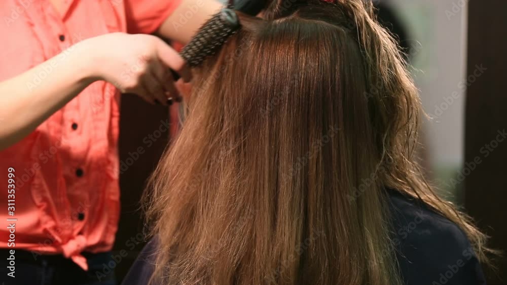 Hair styling women hair dryer in the beauty salon Hair styling women hair dryer in the beauty salon
