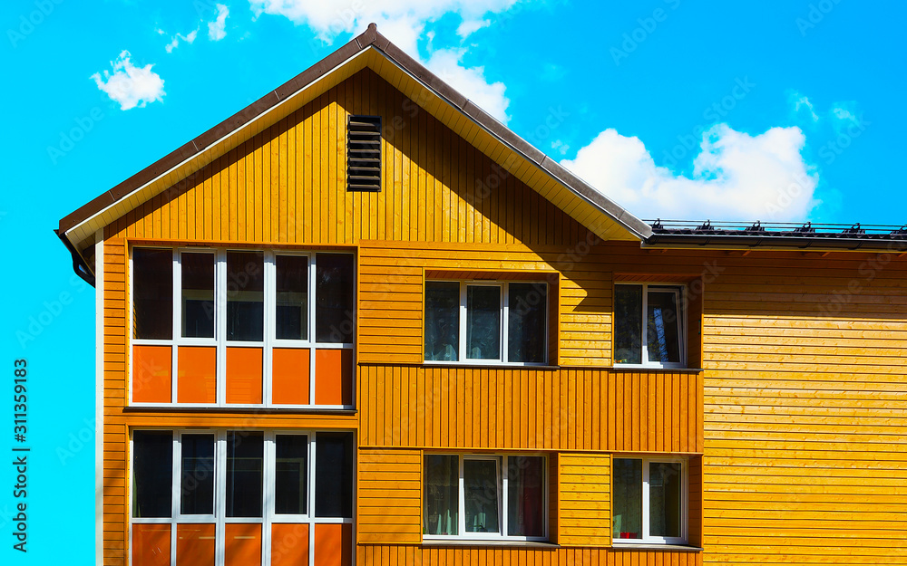 Modern wooden house in Vilnius with reflex