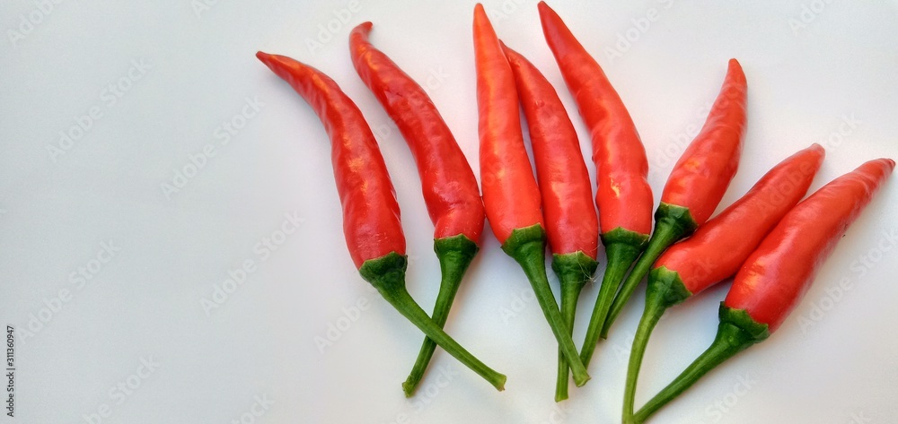 red chili peppers isolated on white background red chili peppers isolated on white background