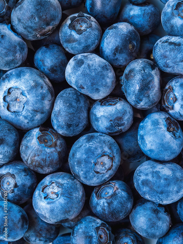 a lot of ripe blueberries closeup - background