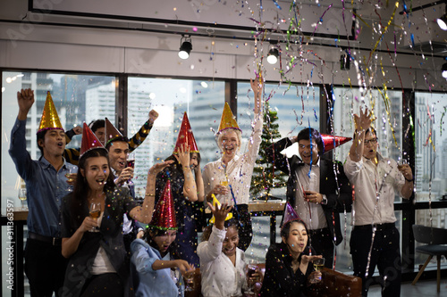 Business persons group happy new year party in the offices. 