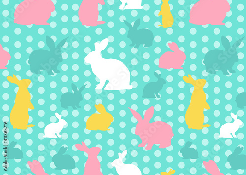 Easter green background with white polka dot and with green, white, pink and yellow bunnies
