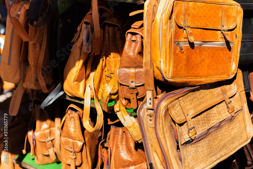 Leather bags in the local market, Asuncion, Paraguay. Close-up.