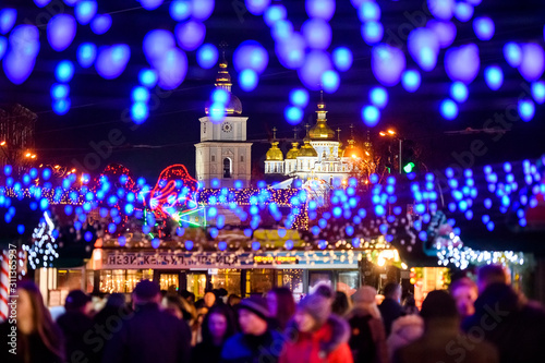 Festive Christmas illuminations and Saint Michael Golden Domed Cathedral in Kyiv, Ukraine. December 2019
