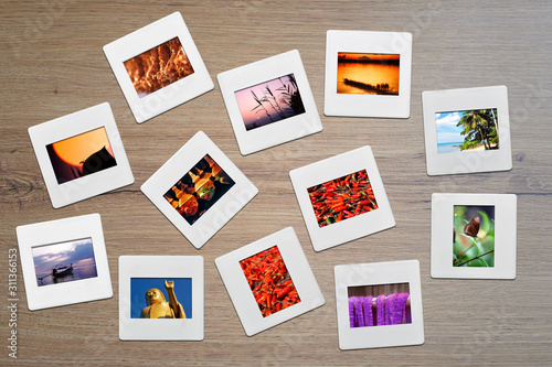 twelve frames Slides isolated on wooden background