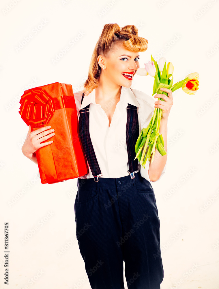 Gifts for Valentines Day. Surprise for a woman. Flowers and a box with a gift for your girlfriend. Gifts for Valentines Day. Surprise for a woman. Flowers and a box with a gift for your girlfriend.