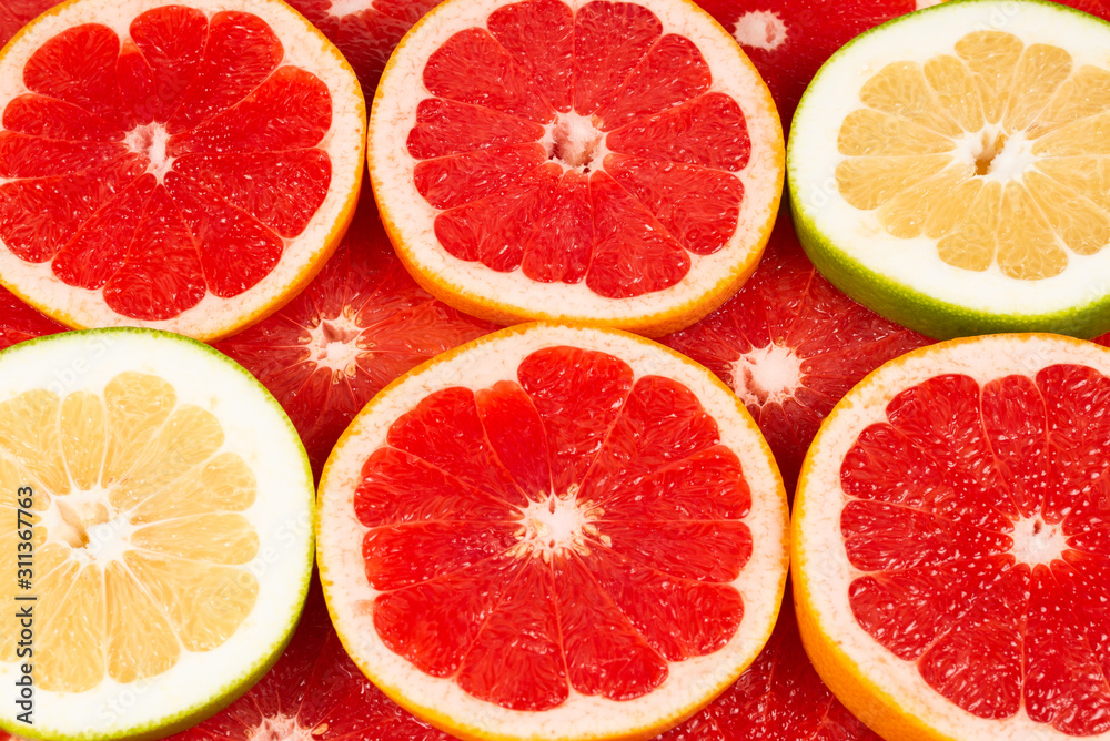 Pomelo and grapefruit slices background. Pomelo and grapefruit slices background.