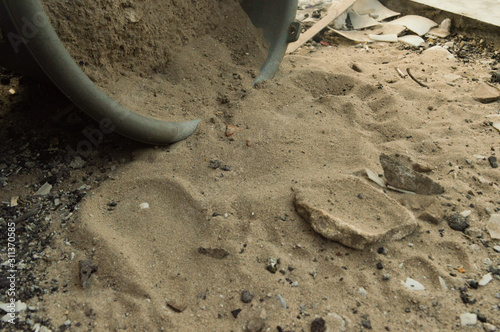 sand with spilled buckets