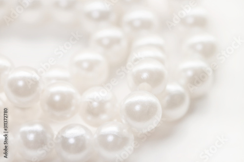 Romantic little pearl beads string isolated background