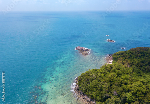 Aerial view of tropical white sand beach with blue cloud sky background at Koh Tha Lu