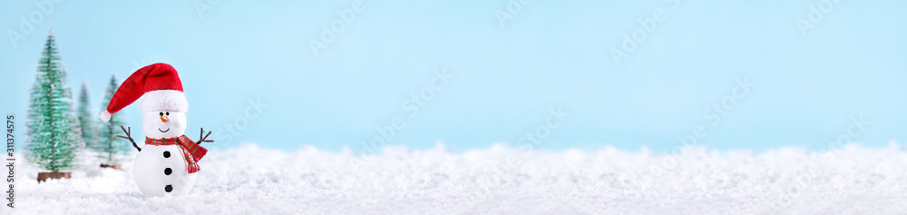 Christmas greeting card. Snowman and new year trees on snow over blue ...