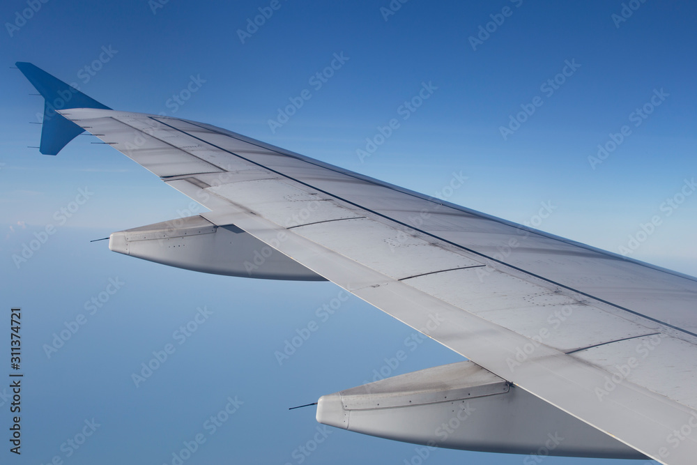 Fototapeta premium aircraft wing plane. Travel concept.