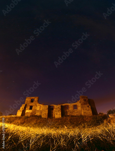 Castle in Siewierz at night photo