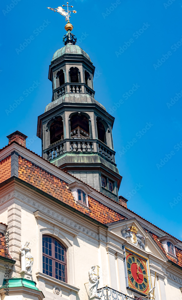 LÜNEBURG, GERMANY - The old, famous Lüneburg town hall built in the Middle Ages is located on the market square, in the north of Germany. On a summer's day in July.