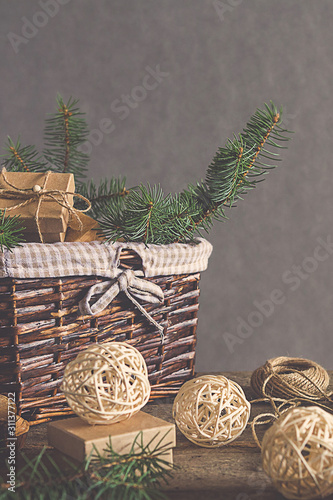 Christmas and zero waste  eco friendly packaging gifts in kraft paper on a wooden table  eco christmas holiday concept  eco decor