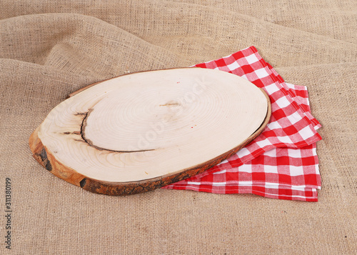 Wooden board on burlap hessian sacking