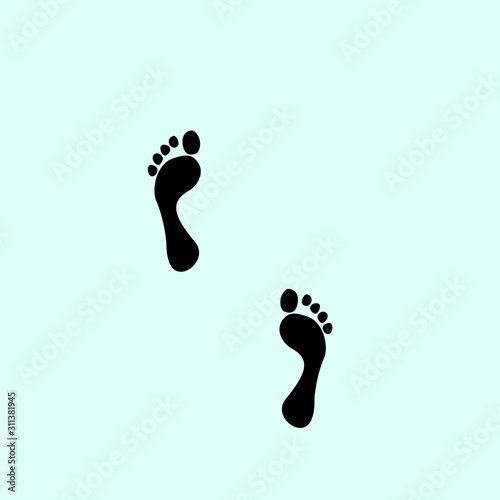footprints on green background
