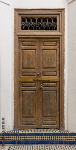 dark wooden door in marrakech © Jesus-Salas-Dual