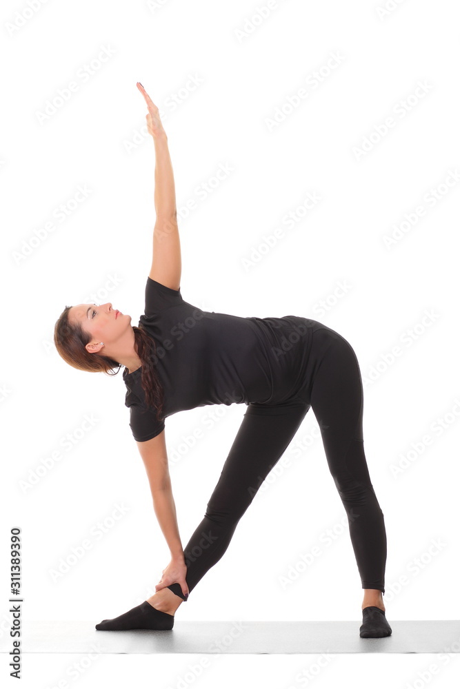 Sporty young woman doing yoga practice