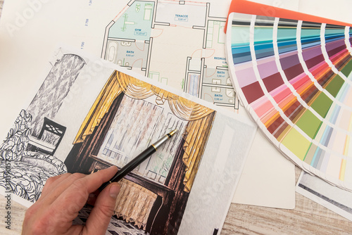 The designer chooses the perfect color for a new apartment. Sketch of a modern apartment.