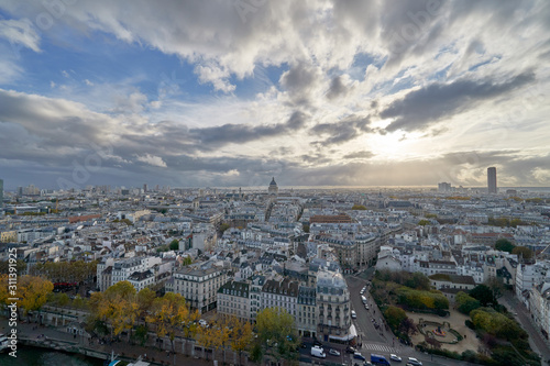 Panoramic view to the Paris and river Seine from the roof of Notre Dame cathedral, France. Cloudy weather. Autumn.       © vadim_ozz