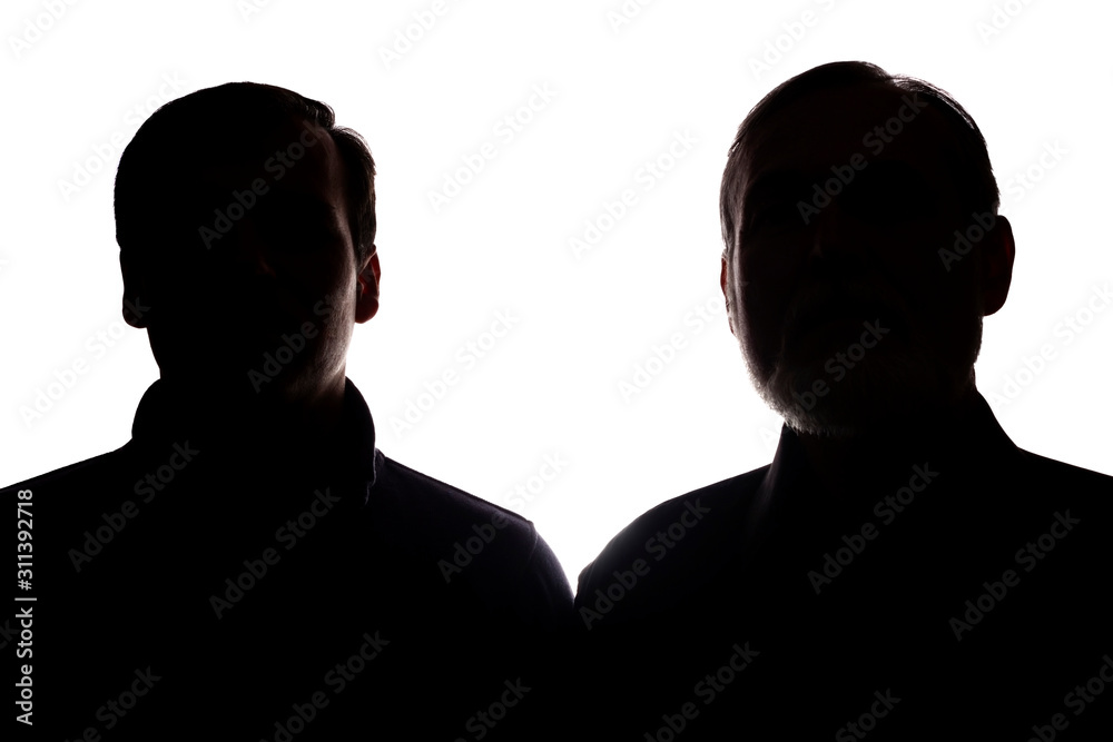 Face portrait old father and adult son opposite - silhouette, family Face portrait old father and adult son opposite - silhouette, family