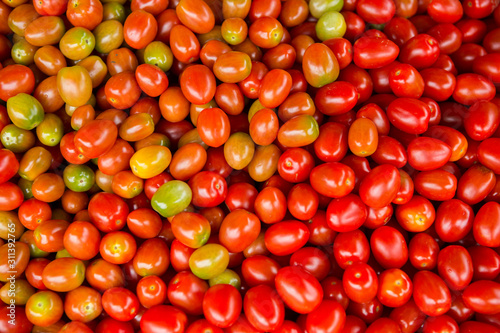Red tomatoes. Tomato background. cherry tomato. Group of fresh tomatoes.