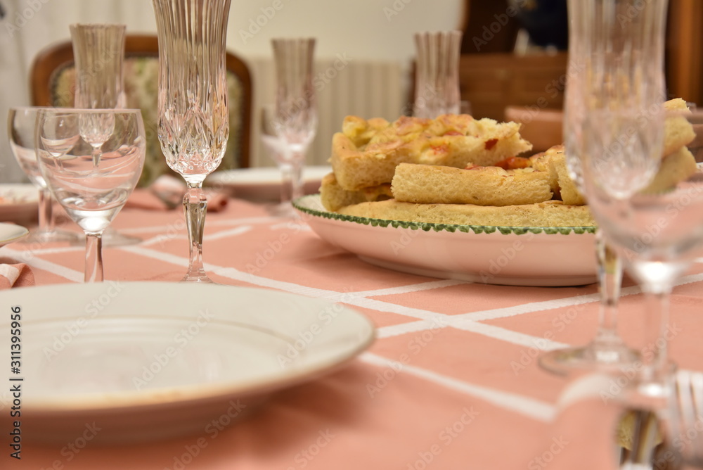 Pizza in the Plate on the Table