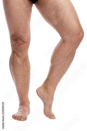 Men's legs. Isolated over white background. Vertical.