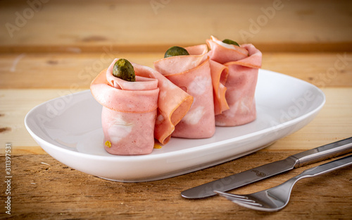 3 involtini di mortadella con cetrioli photo