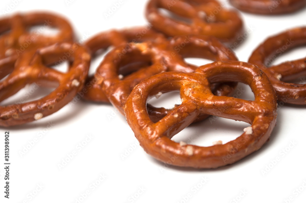 Closeup of salted pretzels on white background Closeup of salted pretzels on white background