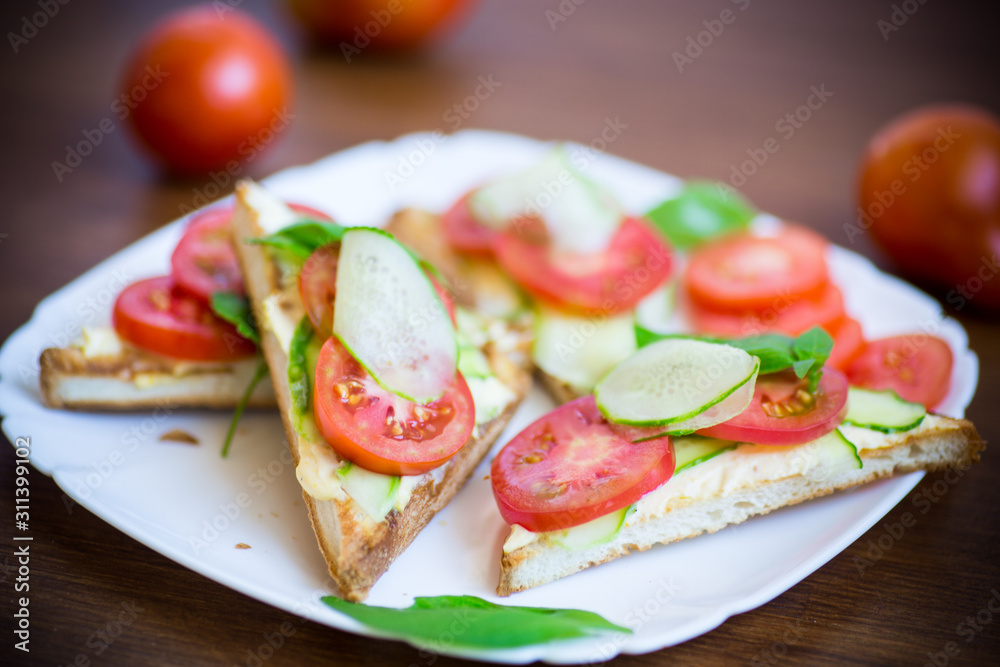 tasty sandwich with curd paste, fresh cucumbers and tomatoes tasty sandwich with curd paste, fresh cucumbers and tomatoes