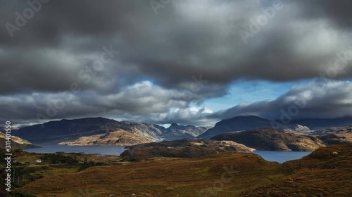 Dramatic Clouds over Scottish Highlands at Autumn photo