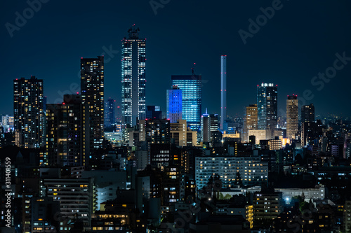 Tokyo city buildings night view and sky © Ken Tyler