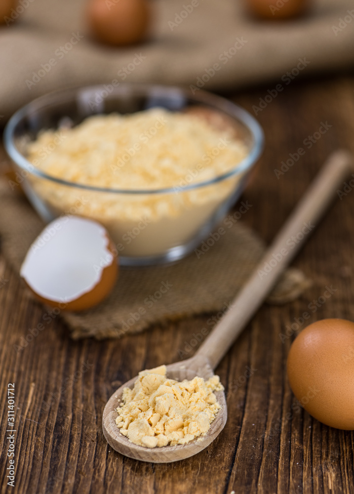 Old wooden table with fresh Powdered Eggs (close-up shot; selective focus) Old wooden table with fresh Powdered Eggs (close-up shot; selective focus)