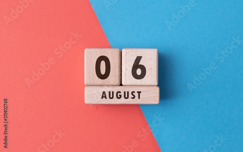 August 6 written with wooden blocks